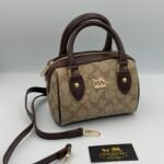 COACH SPEDDY 17CM Marron chocolat