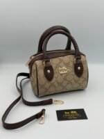 COACH SPEDDY 17CM Marron chocolat